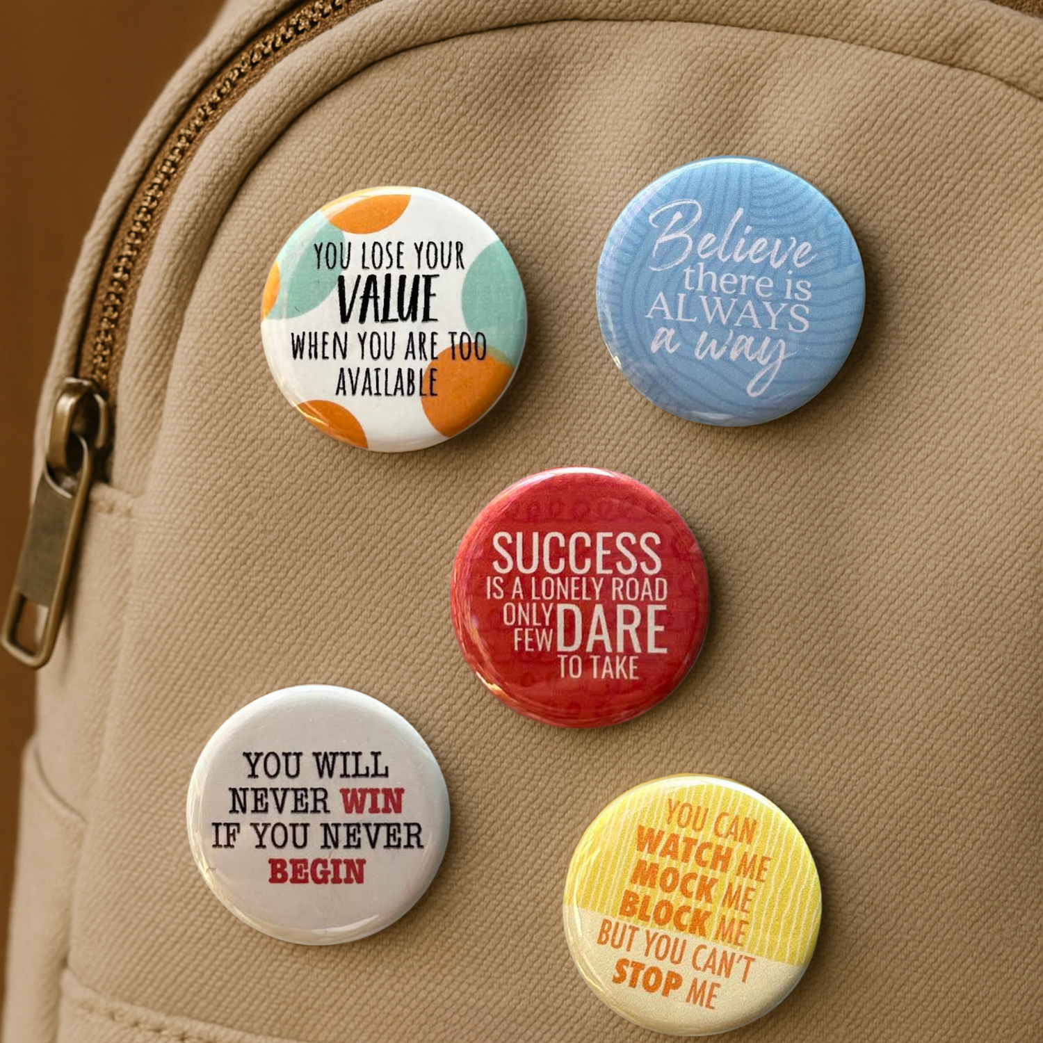 A collection of Pins on a backpack